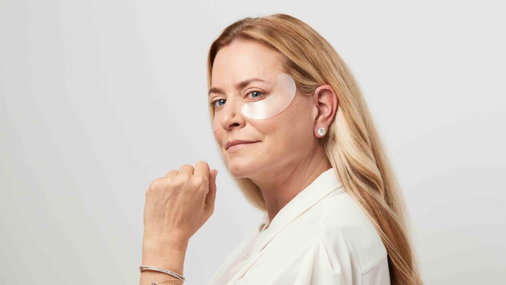 SiO Beauty founder Gigi Howard wearing the brand's under-eye patches