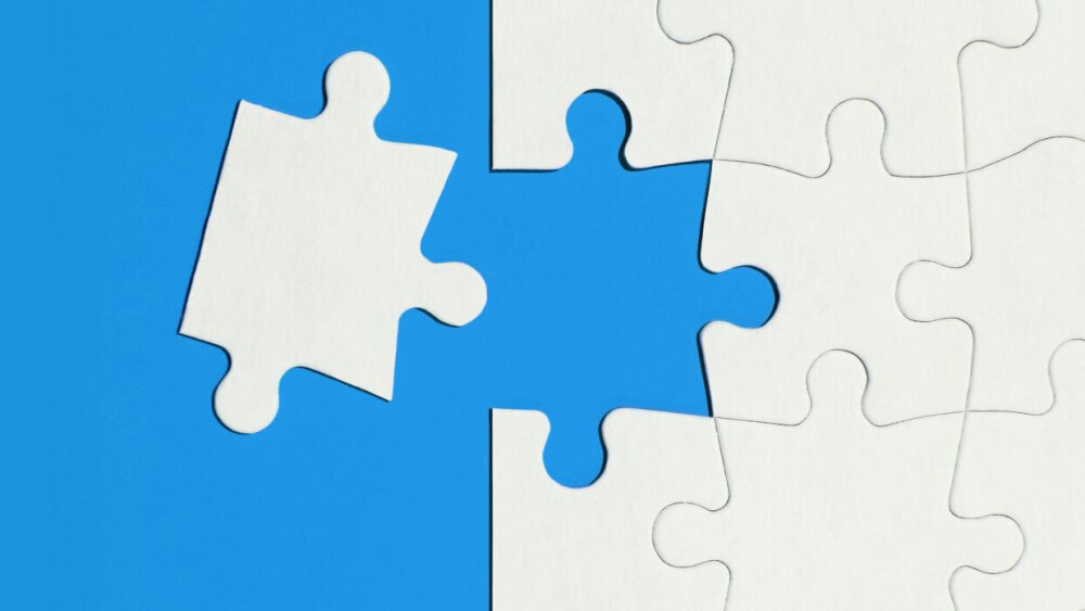 A piece of a puzzle connecting to other pieces.