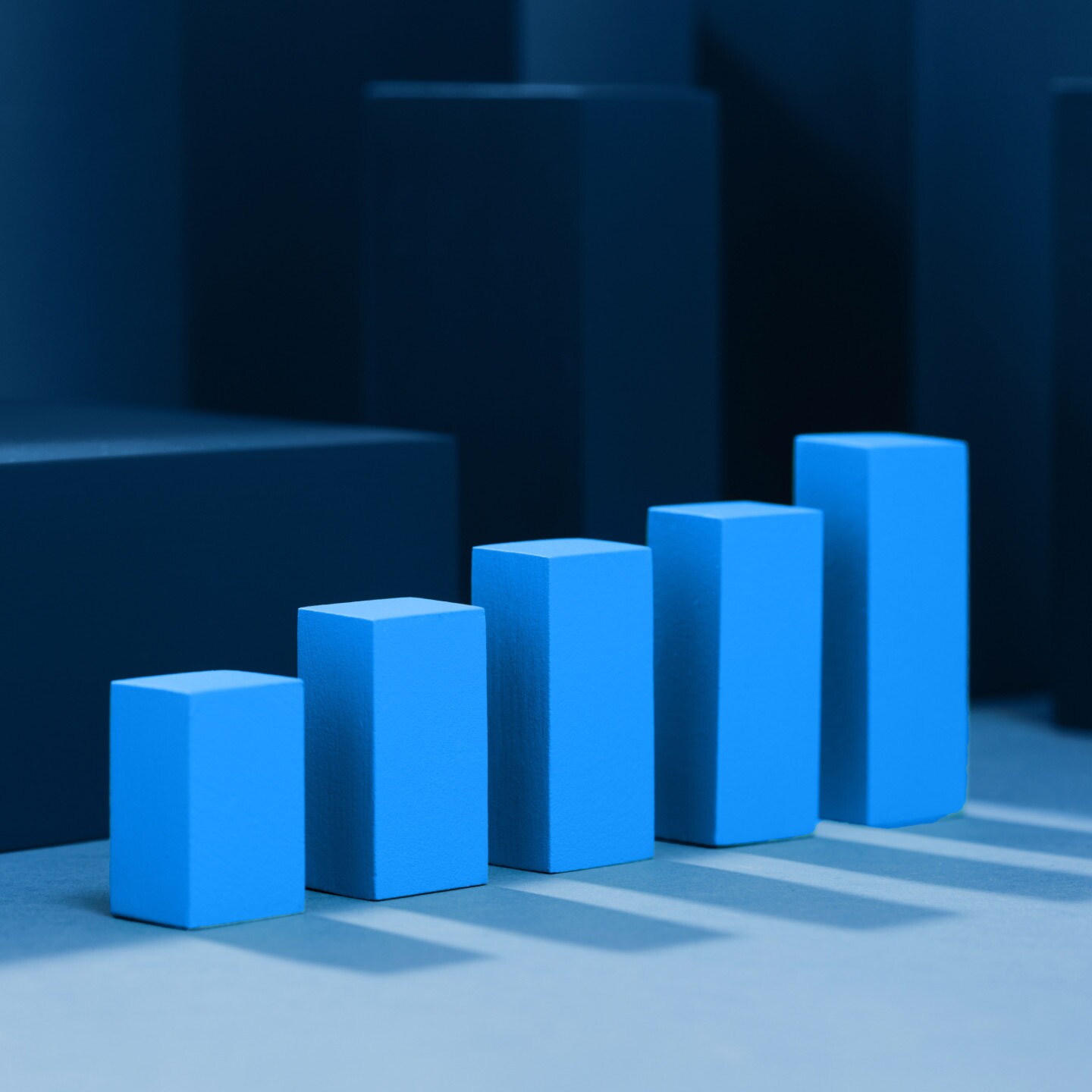 Computerized graphic of bar graph showing positive progression. 