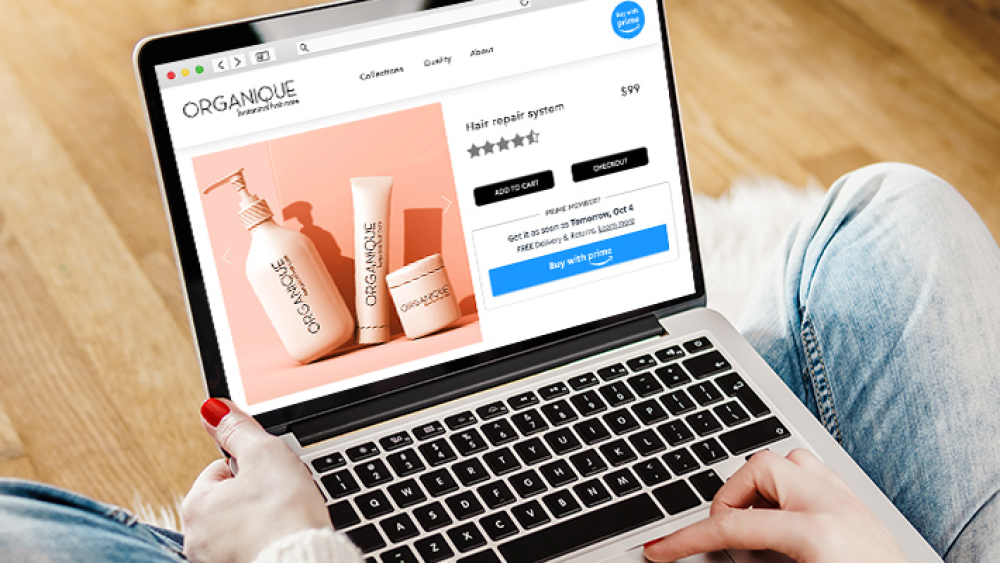 Open laptop showing a Buy with Prime product page